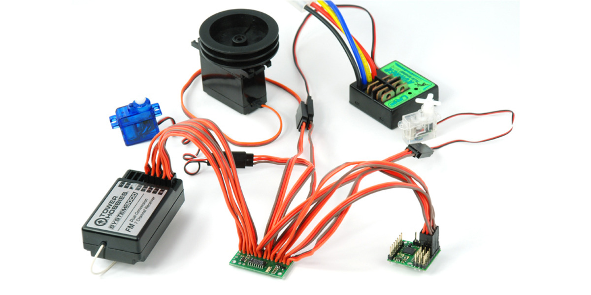 Pololu RC multiplexer with servo cables directly soldered in, connected to RC receiver and